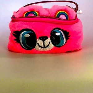 Cute girl bag. From Claire’s, it’s medium small, and pink/rainbow.